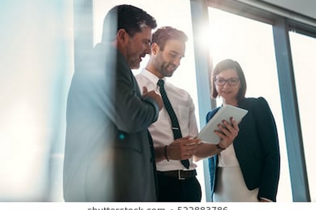 group-businesspeople-using-digital-tablet-260nw-522883786 group-businesspeople-using-digital-tablet-260nw-522883786